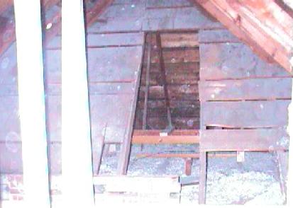 solid, wide boards visible in the attic