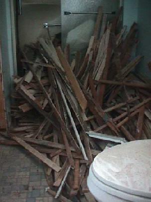 bathroom filled with some of the wooden lath we've removed
