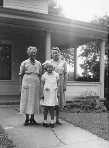 Adene with family members in front of her home in August 1942
